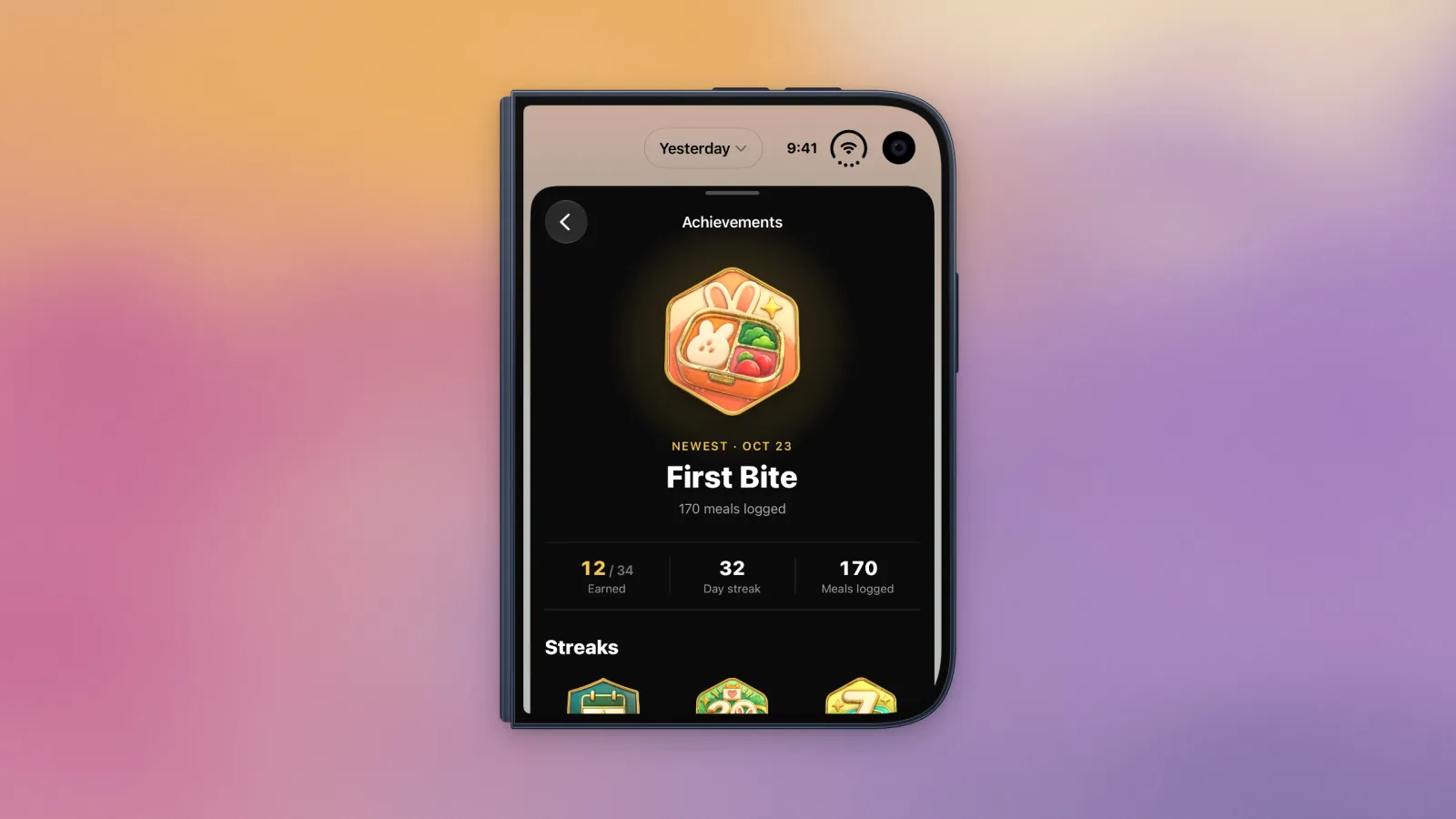The Bento Bunny achievements screen on iPhone Duo, with the First Bite badge as the newest badge and counts for badges earned, day streak and meals logged